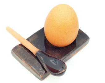 Black rectangular egg cup and spoon