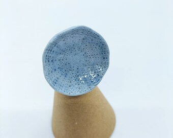 Circular ring in blue glazed ceramic