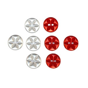 May include: Eight buttons, four red and four white, with a five-pointed star design. The buttons have two holes.
