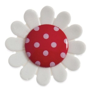 May include: A white daisy with a red center with white polka dots.