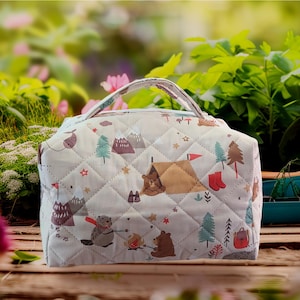 Trousse de toilette matelassée, style vanity case , motif dinosaures , pour bébé ou enfant