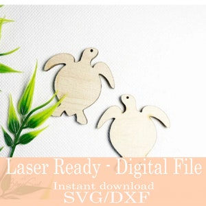 May include: Two wooden turtle cutouts with a light wood grain finish. The turtles are displayed on a white background with green leafy accents. Text at the bottom reads "Laser Ready - Digital File" and "Instant download SVG/DXF".