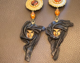 Boucles d’oreilles clips vintage XXL masque cuir