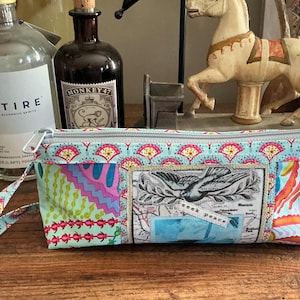 Handmade Recycled Fabric Zipper Pouch: Eco-Friendly Travel Cosmetic Bag. SWB 5