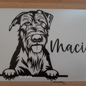 May include: Black and white silhouette of a dog's head and paws peeking over a surface. The dog's name, "Macie", is written in cursive below the image. The text "MyCraftyDog" is in the bottom left corner.