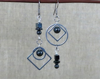 Asymmetrical, mismatched, geometric earrings, long, light loops, hematite stone, rings, square stainless steel.