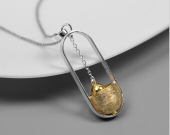 Pendant in 925 sterling silver and vermeil with a small bell motif