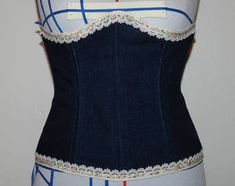 Denim waist cincher with lace trim.