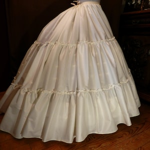 Large Second-Empire elliptical crinoline petticoat; the steel structure under the petticoat is not included in the purchase.