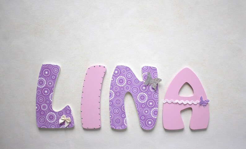 taille 14 ans en lettre