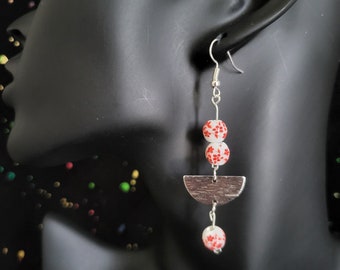 Earrings, ceramic flower beads, semi-circle pendant.tif