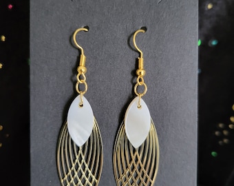 Gold oval pendant earrings and natural mother-of-pearl