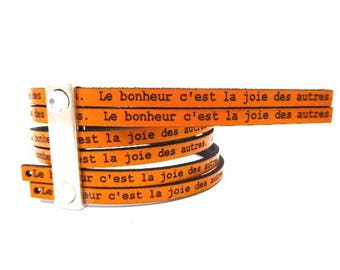 5 mm flat leather Tan with message happiness is the joy of others, sold by 20 cm