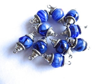 10 blue beads with silver cups