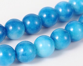 Perle jade mashan naturelle,ronde,teint bleu chamarré,10 mm,vendu par 10