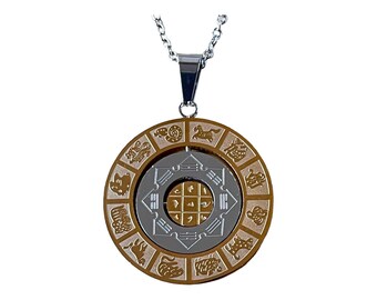 Zodiac symbol medallion in gold and silver stainless steel, 3 cm in diameter