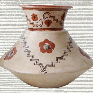 May include: A white ceramic vase with a wide base and a narrow neck. The vase is decorated with black and red geometric patterns and stylized flowers.