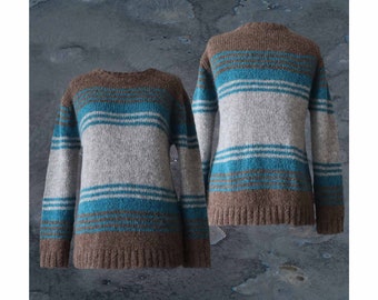 Women's sweater made from an alpaca blend yarn, with a soft brushed texture and a stripe design featuring three different colors.