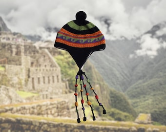 Unisex Peruvian Chullo baby alpaca lined, multicolor Andean Mountain hat with ear flaps.