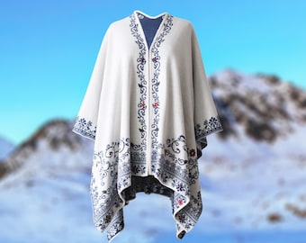Alpaca wrap reversible, jacquard knitted ruana with hand embroidered details, color white - blue