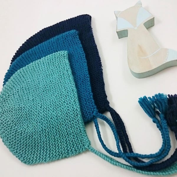 Joli petit beguin/bonnet pour bébé tricoté main en pure laine  très douce