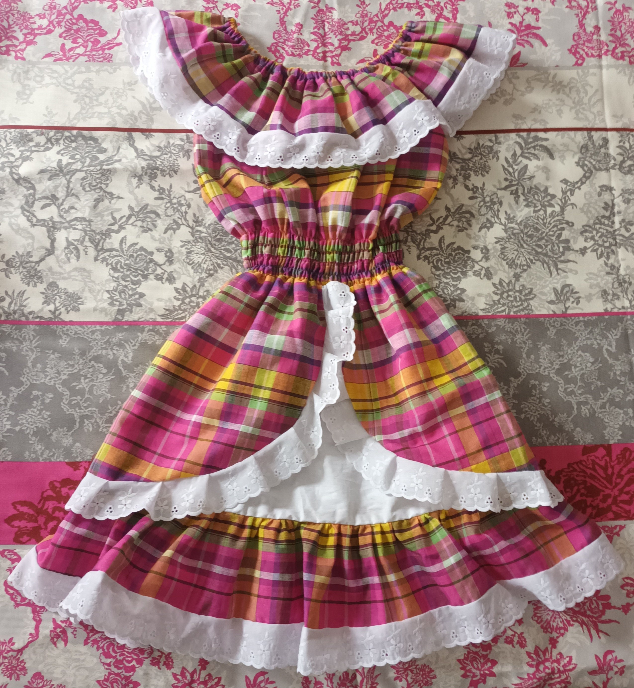 quadrille dress Wearing a dress, known as karabela dress, a trad and lightweight chiffon fabric What is Jamaican Quadrille Dress