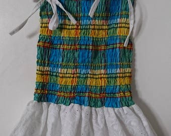 Girl in madras eyelet dress