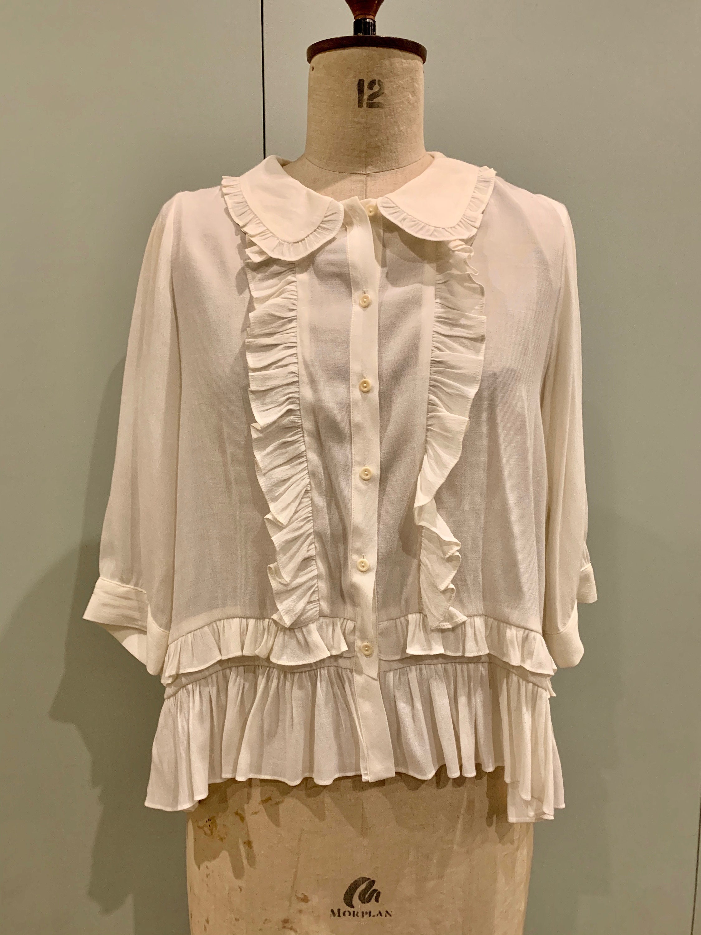 Image of S Cream Ruffle Top