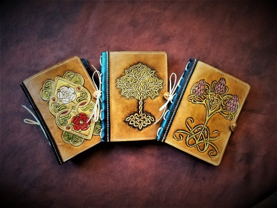 Medieval celtic grimoires, leatherbooks, tree of life, 2 roses of England or thistle