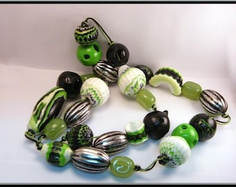 Necklace beads green circus black and white polymer clay.