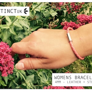 May include: A pink leather bracelet with a silver clasp. The bracelet is 4mm wide and is made of leather and steel.  Womens Bracelet 4MM - Leather + Steel
