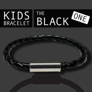 May include: A black braided bracelet with a silver clasp. The bracelet is labelled "KIDS BRACELET THE BLACK ONE" in white text on a black background.