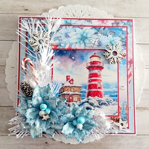 Carte de Noel avec illustration phare et maison du littoral blanc rouge et bleu fait main 15x15 cm