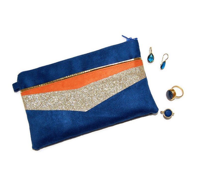 orange suede clutch bag