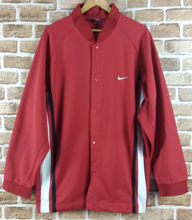 nike swoosh track top