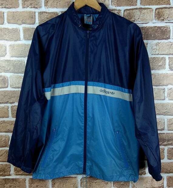 Vintage blue 80s Adidas cagoule windbreaker coat - Depop