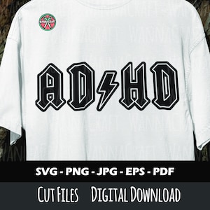 May include: A white t-shirt featuring the black text AD/HD with a lightning bolt symbol replacing the slash. A circular logo with scissors and the text WANNACRAFT is in the upper left corner. The bottom includes the text SVG - PNG - JPG - EPS - PDF.
