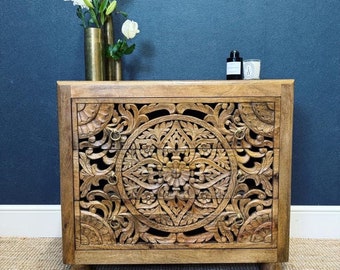 Hand carved chest of drawers made from mango wood