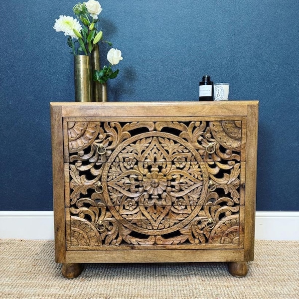 Hand carved chest of drawers made from mango wood