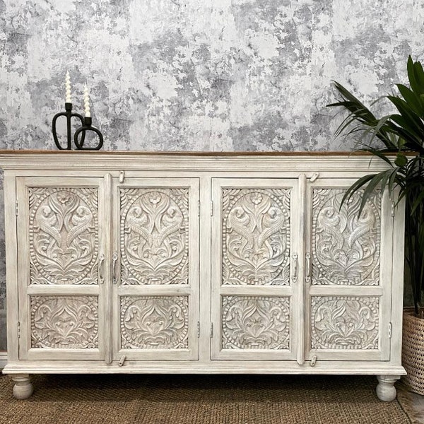 Carved four door sideboard made from mango wood