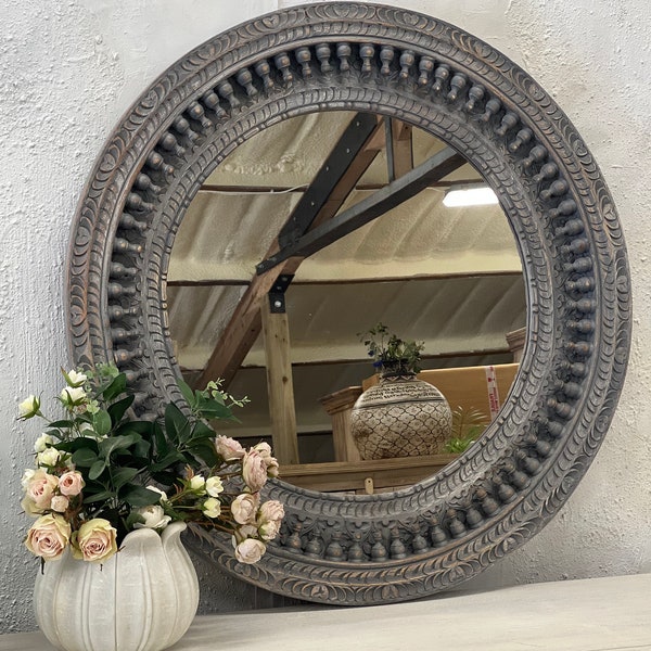 Round carved Indian mirror