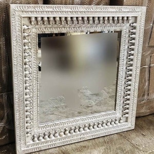 Beautiful heavily carved Indian mirror