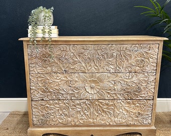 Carved chest of drawers made from mango wood