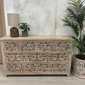 Carved mango wood chest of drawers