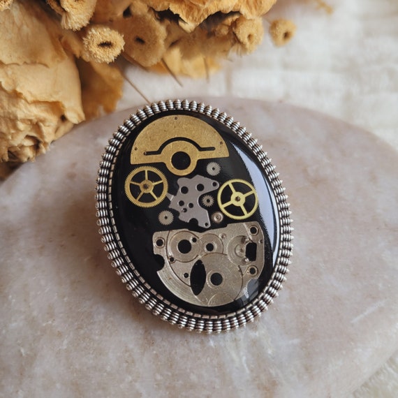 Steampunk brooch deals