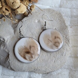 Crystallized rooster feather earrings. Feather earrings. Ethical and bohemian jewelry.