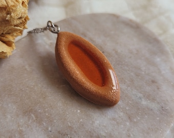 Resin apricot biscuit tray pendant. Sold alone or with a chain. Resin biscuit necklace. Mother's Day gift