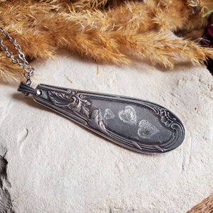 Antique spoon pendant with engraved heart motif. Spoon handle pendant. Sold alone or with a chain.