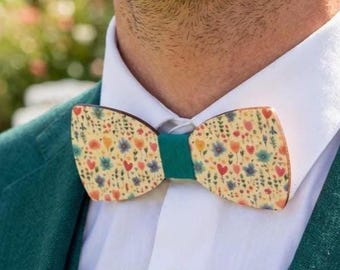 Wooden bow tie with flowers and hearts
