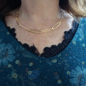 Gold necklace with large link paperclip chain, gold choker